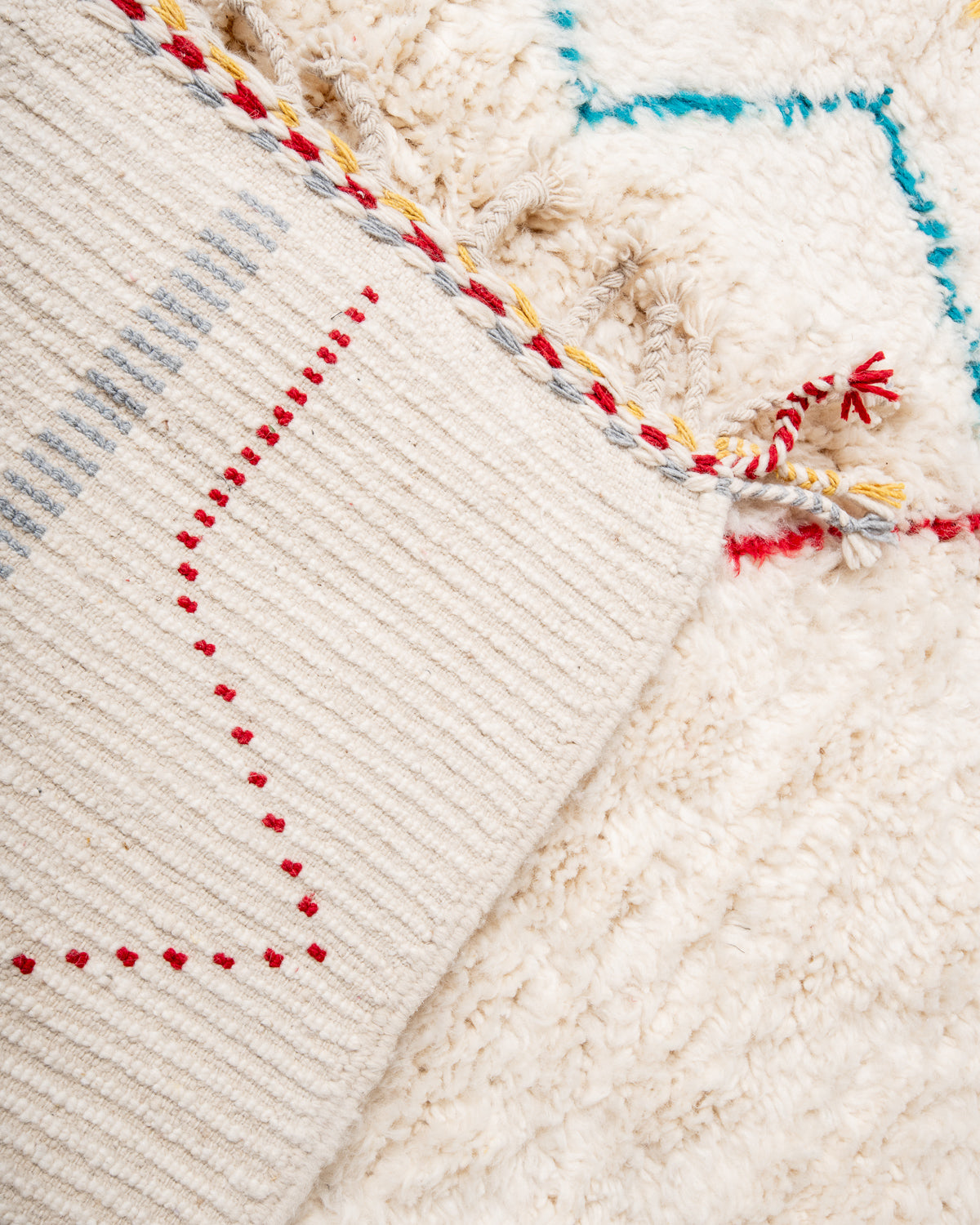 Modern, designer, handcrafted Berber rug from Morocco. Beniourain carpet with beautiful colours and patterns and fluffy wool texture.